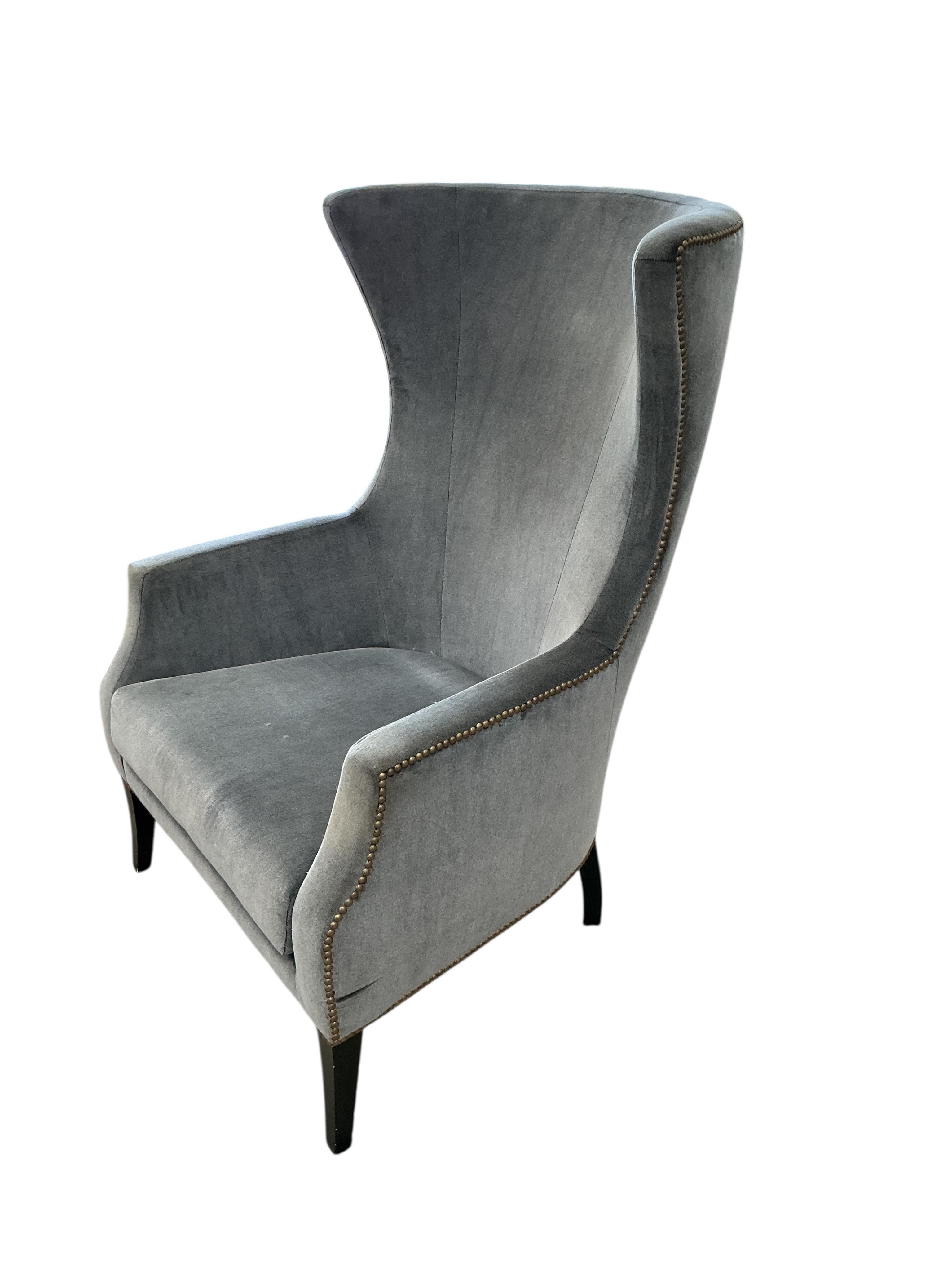 A Contemporary upholstered armchair, width 70cm, depth 72cm, height 110cm